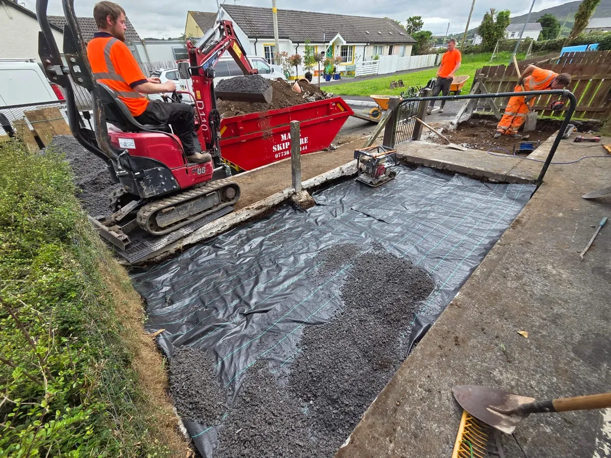 The patio and fence taking shape